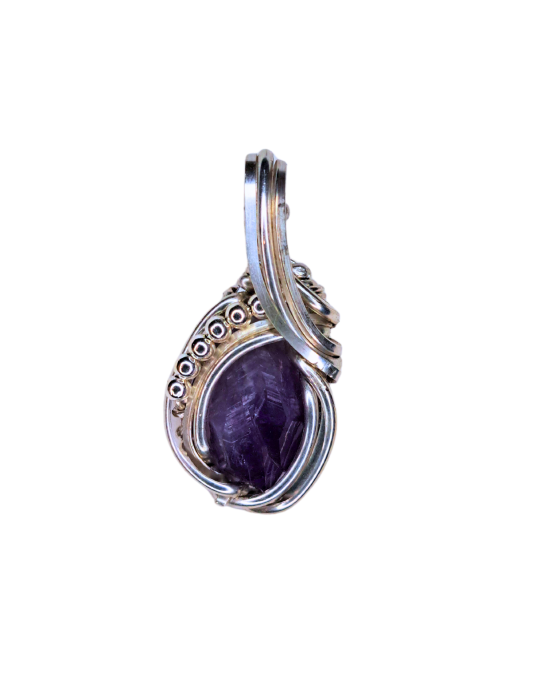 Wire-wrapped pendant with a rough purple amethyst stone in beaded silver and gold-fill wire